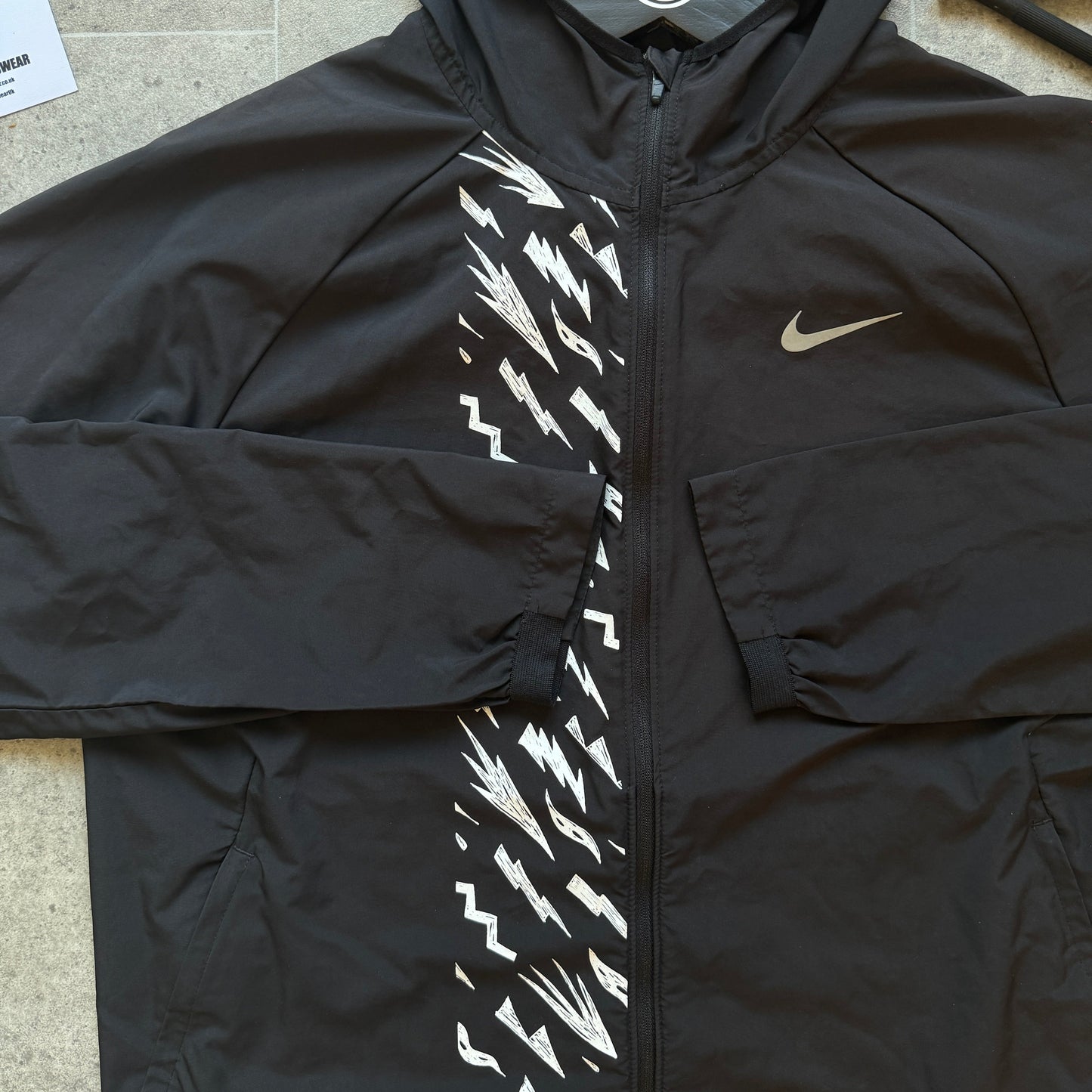 NIKE ‘BOLT’ WINDRUNNER - BLACK