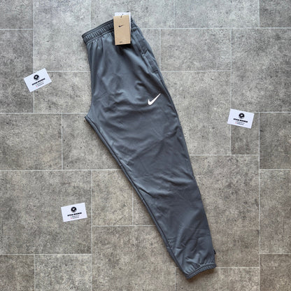 NIKE THERMA-FIT CHALLENGER PANTS - GREY