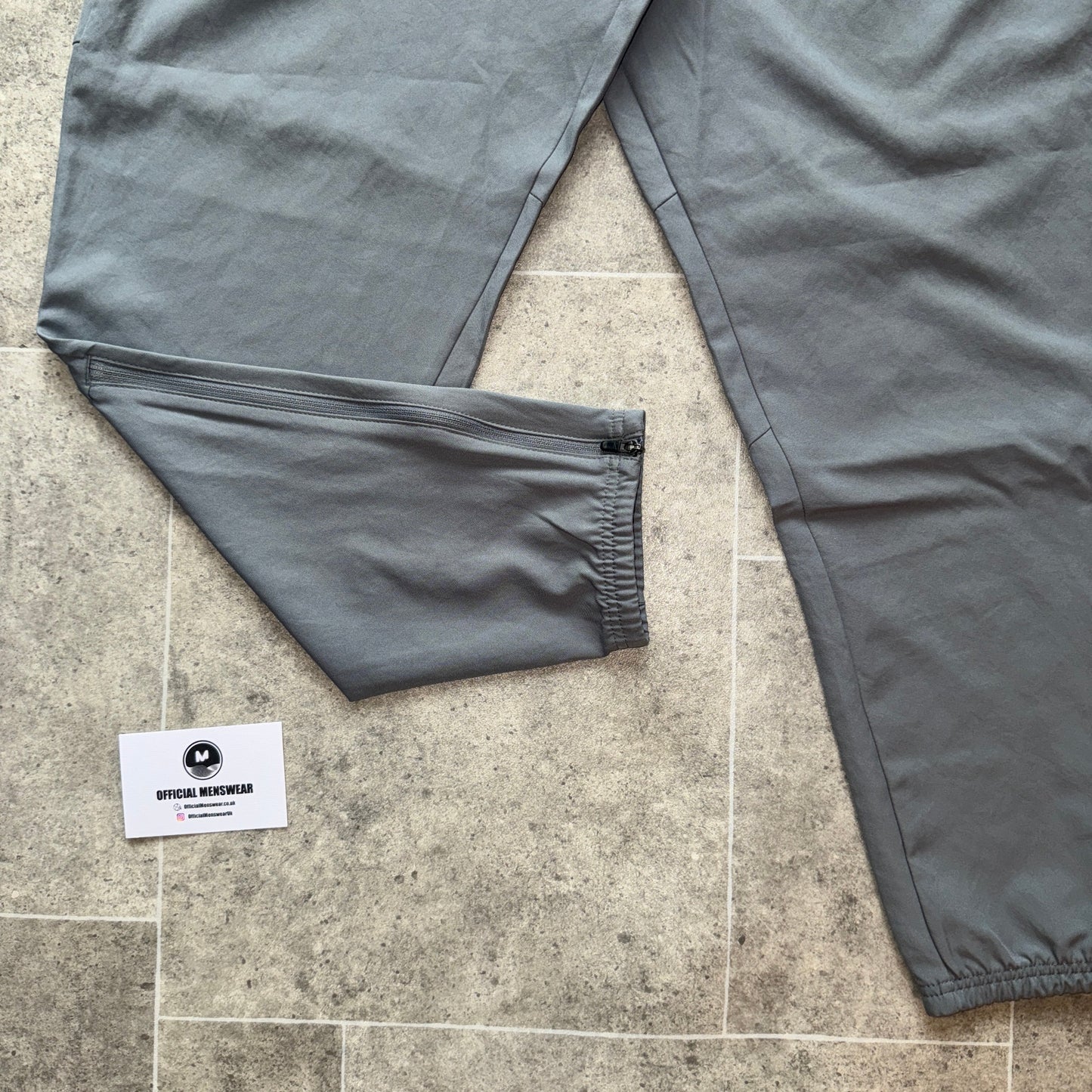 NIKE DRI-FIT CHALLENGER PANTS - GREY