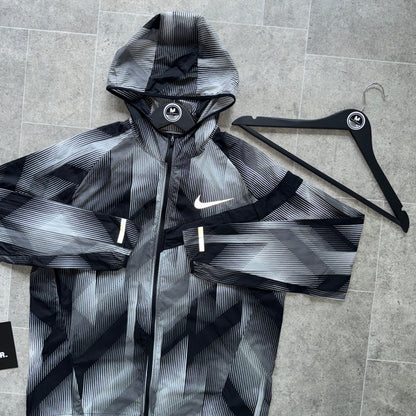 NIKE ‘IMPOSSIBLY LIGHT’ JACKET