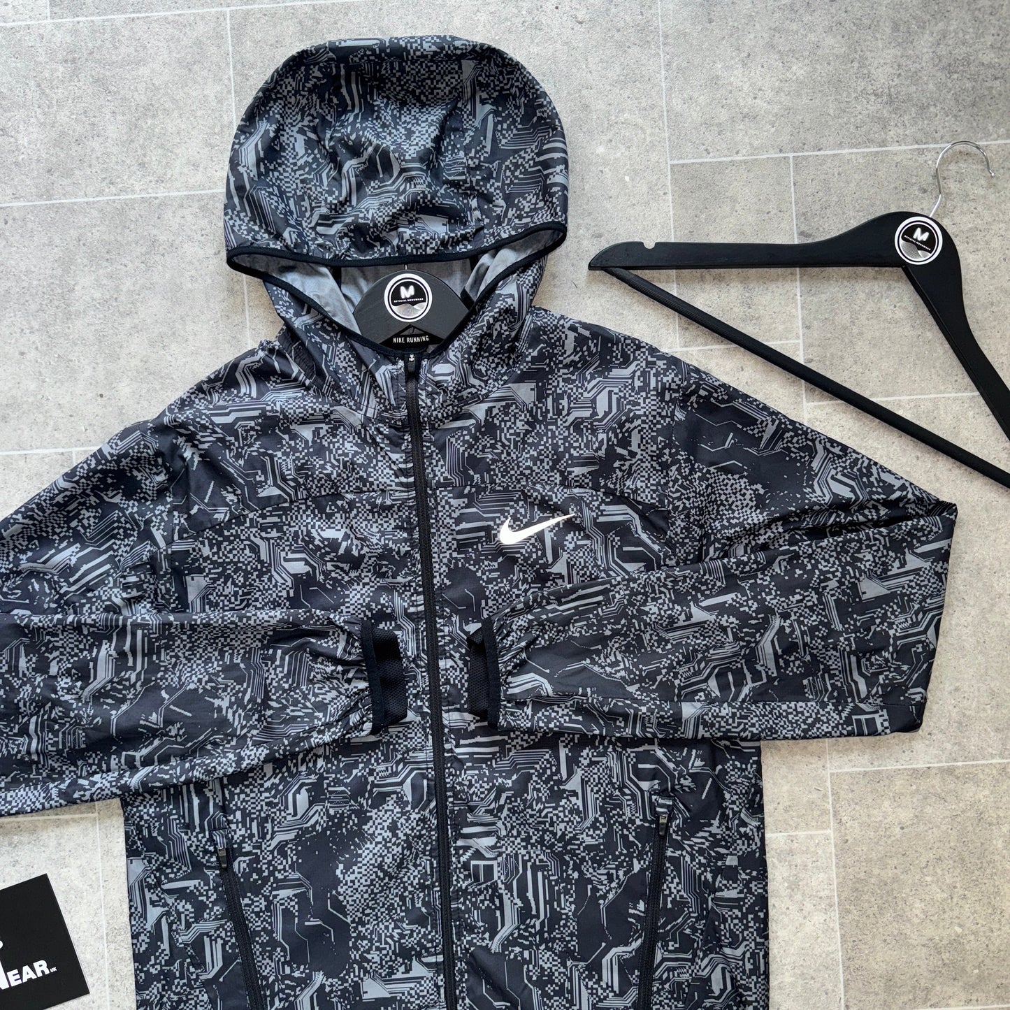 NIKE ‘EXCLUSIVE’ GLITCH WINDBREAKER - BLACK