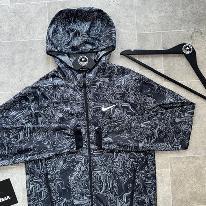 NIKE ‘EXCLUSIVE’ GLITCH WINDBREAKER - BLACK
